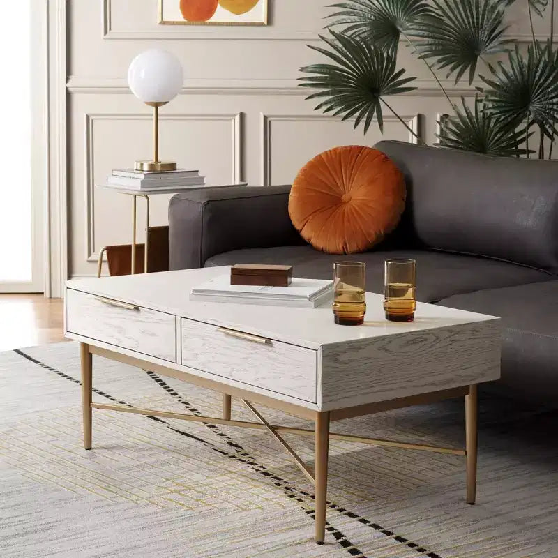 Table basse rectangulaire avec 2 tiroirs et plateau en placage de chêne, pieds dorés